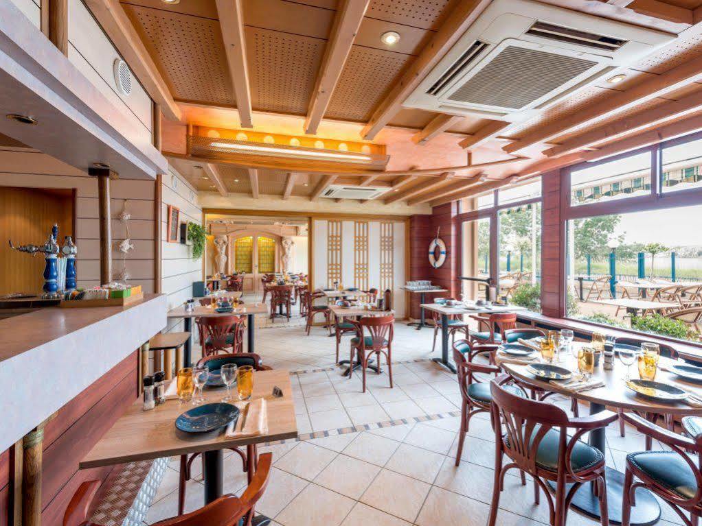 Logis Hotels - Au Poisson D'Argent - Hotel 3 Etoiles Et Restaurant Le Mesnil-en-Vallee Екстер'єр фото